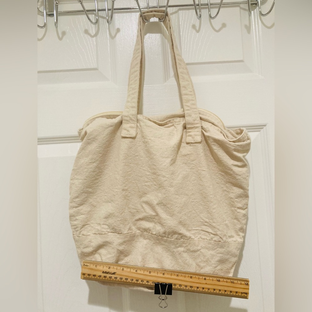 PBS Kids Cream Tote Bag: Little paint on one handle otherwise like new! - Picture 2 of 5